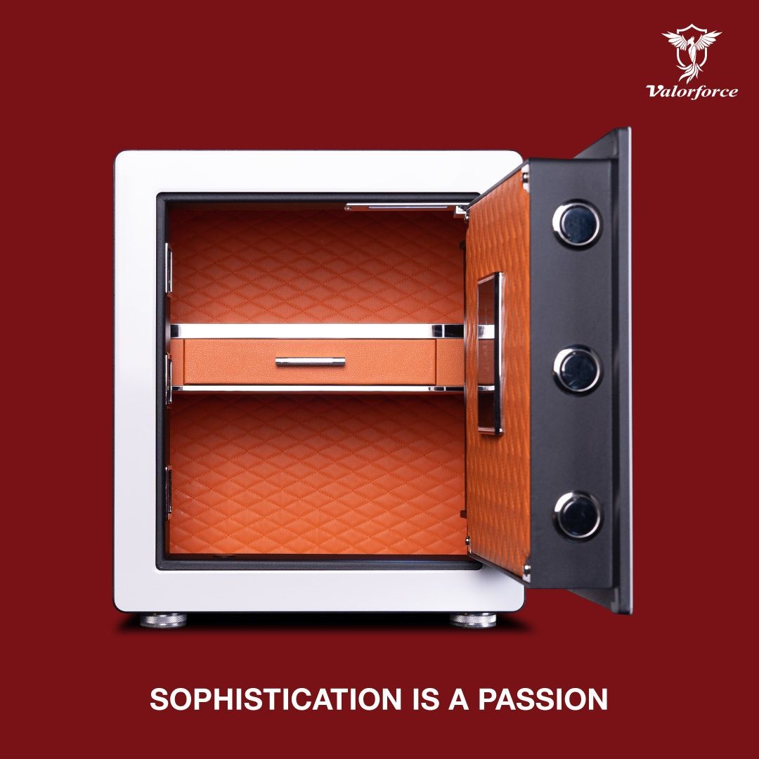 Le Blanc safe biometric fingerprint scanner close-up
Le Blanc safe orange interior with jewelry drawer